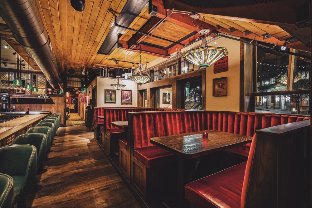 Red velvet booths in Buckatabon's Tavern